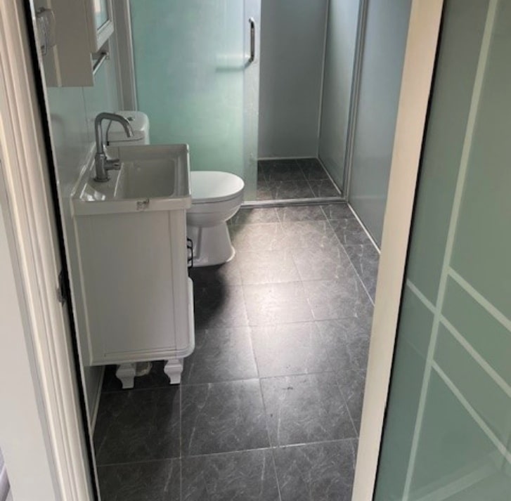 Dark Grey Tiled bathroom (1)